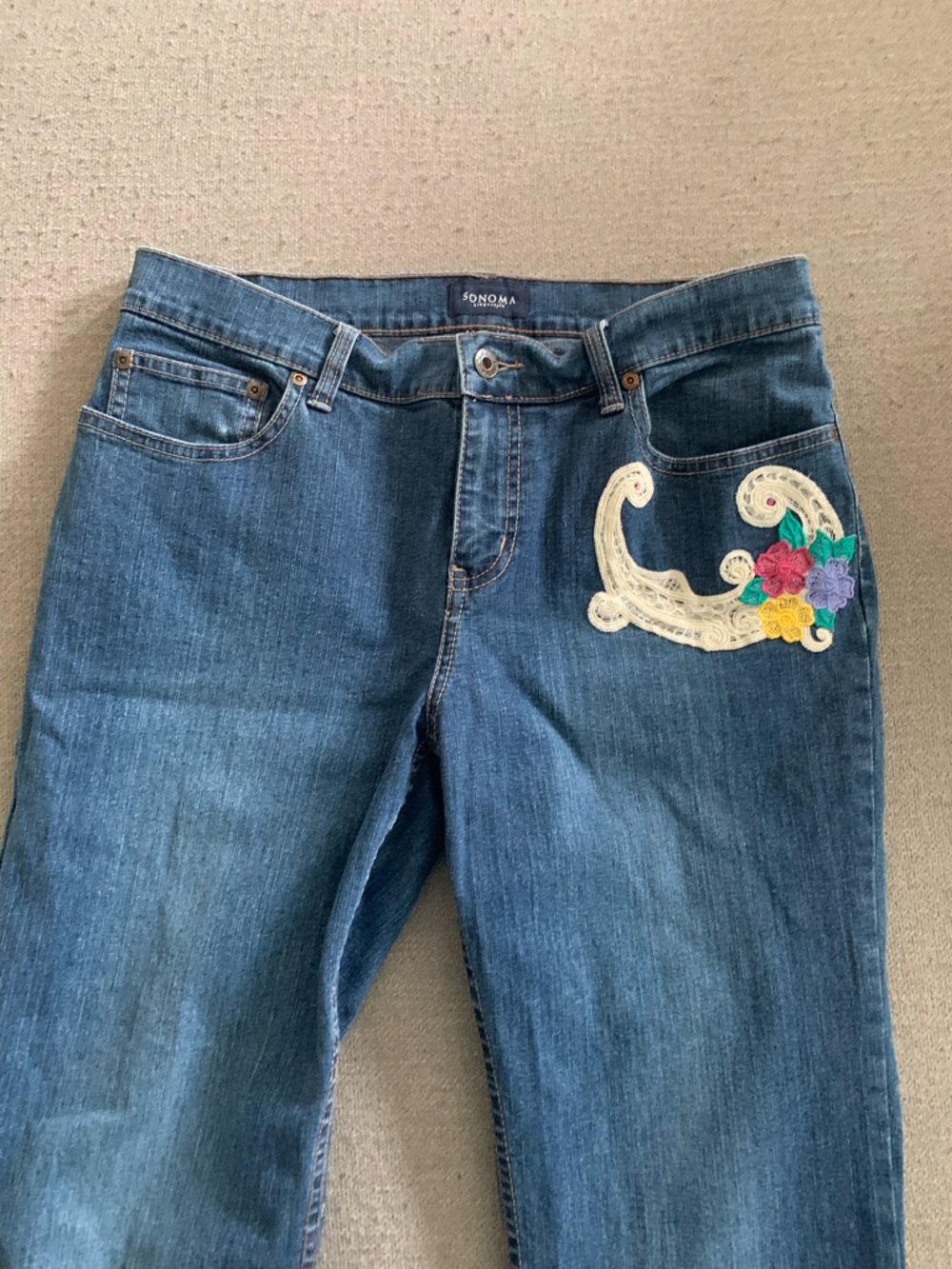 Sonoma Blue Straight Leg Jeans with Lace Swirl and Multicolored Floral Applique